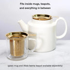 Gold tea infuser with teapot and mug