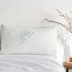 Adjustable bamboo cooling pillow on a bed
