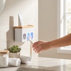 Toothbrush holder with automatic dispenser and UV feature